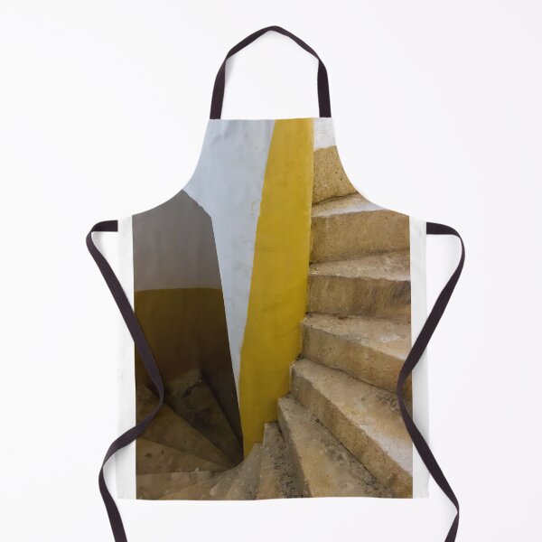 Item preview, Empty Yellow Stairwell With Worn Stone Steps And Black Metal Railing In Apartment Building designed and sold by Nmallia.
