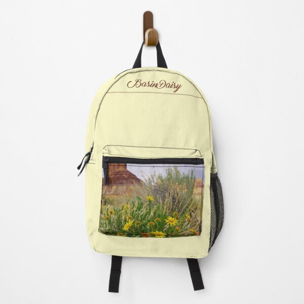 Item preview, Wild yellow desert flowers bloom beneath towering red rock formations in the American Southwest. designed and sold by Kabbrisons.