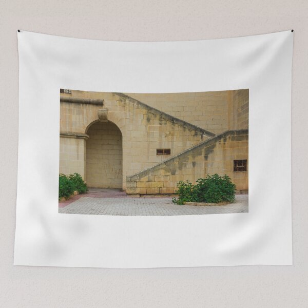 Item preview, Historic Limestone Staircase And Arched Courtyard Wall With Green Shrubs And Paved Pathway designed and sold by Nmallia.