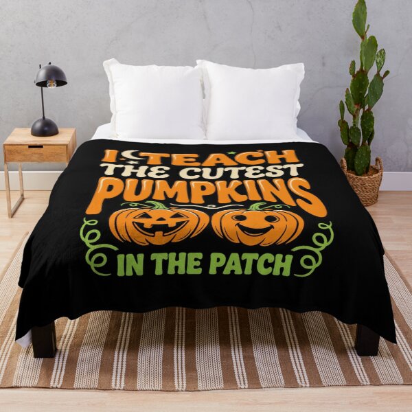 Item preview, I Teach The Cutest Pumpkins In The Patch Funny Jack O Lantern Teacher Tee designed and sold by MizoX7.