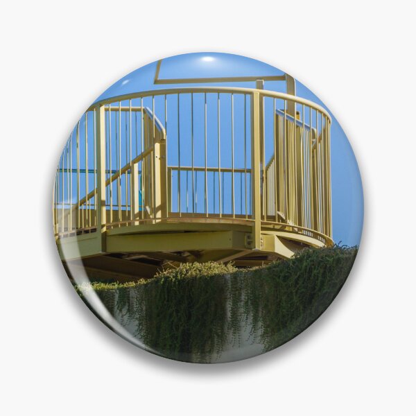 Item preview, Yellow Rooftop Observation Deck With Curved Railing and Hanging Ivy Against Blue Sky designed and sold by Nmallia.