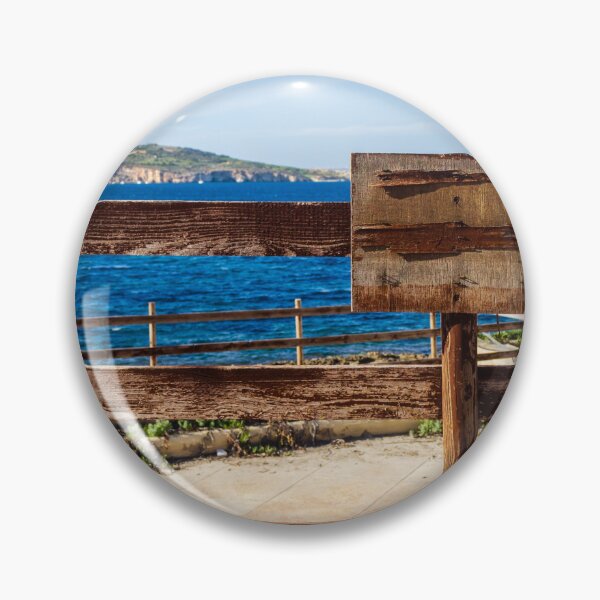Item preview, Weathered Wooden Fence Overlooking Blue Sea and Distant Coastal Landscape on Sunny Day designed and sold by Nmallia.