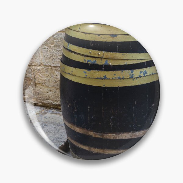 Item preview, Rustic Wooden Barrel Against Weathered Stone Wall On Old Cobblestone Street designed and sold by Nmallia.