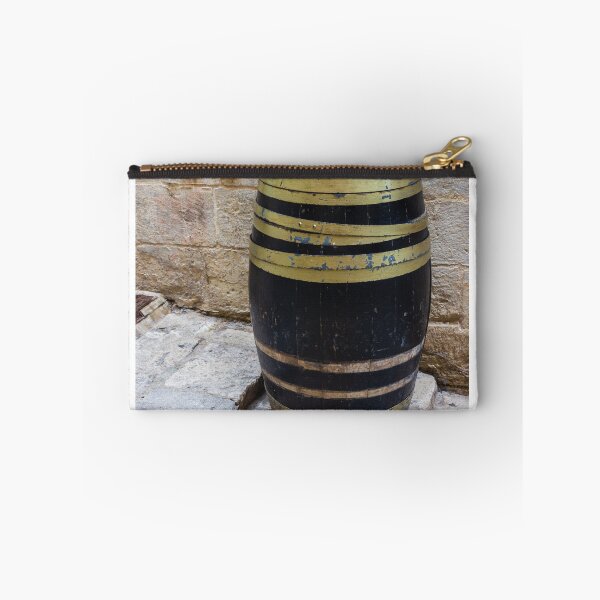 Item preview, Rustic Wooden Barrel Against Weathered Stone Wall On Old Cobblestone Street designed and sold by Nmallia.