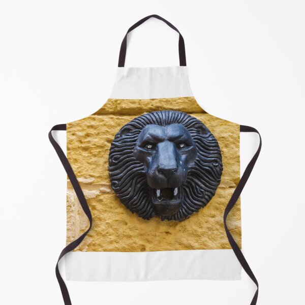 Item preview, Black Lion Head Sculpture Mounted on Yellow Stone Wall, Vintage Architectural Decorative Detail designed and sold by Nmallia.