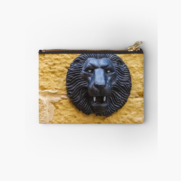 Item preview, Black Lion Head Sculpture Mounted on Yellow Stone Wall, Vintage Architectural Decorative Detail designed and sold by Nmallia.