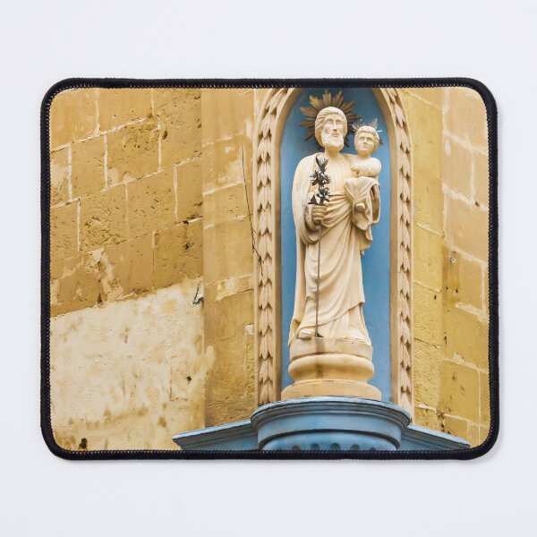 Item preview, Saint Statue In Church Niche Mounted On Weathered Stone Wall With Blue Decorative Plinth designed and sold by Nmallia.