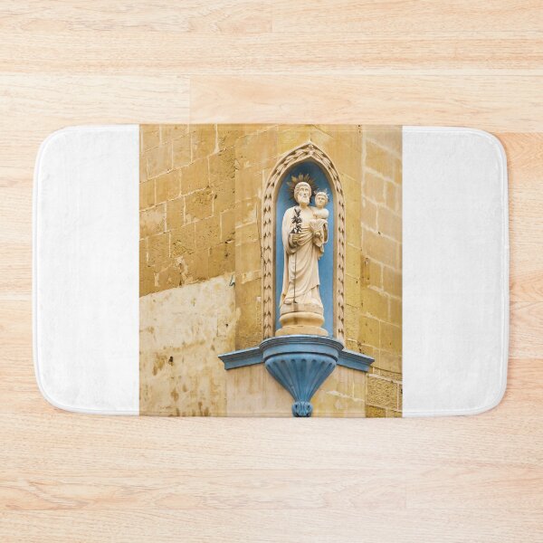 Item preview, Saint Statue In Church Niche Mounted On Weathered Stone Wall With Blue Decorative Plinth designed and sold by Nmallia.