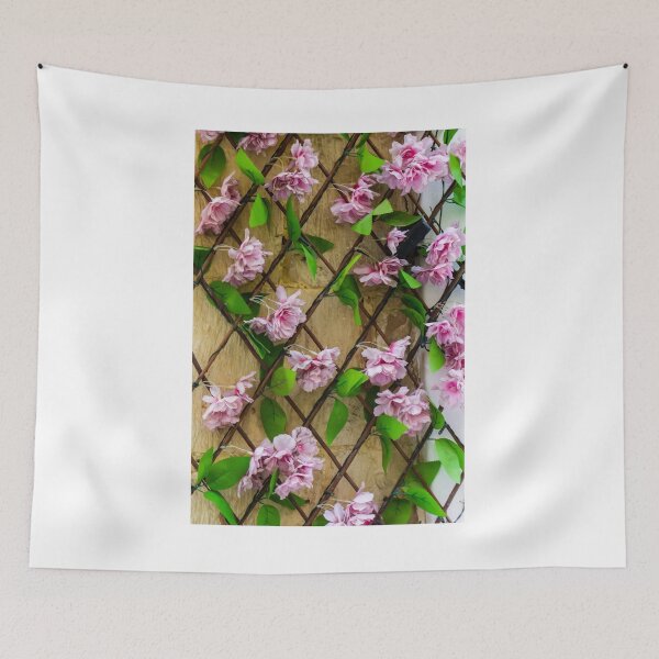 Item preview, Pink Artificial Flowers On Wooden Trellis Against Stone Wall Decorative Floral Display For Home designed and sold by Nmallia.