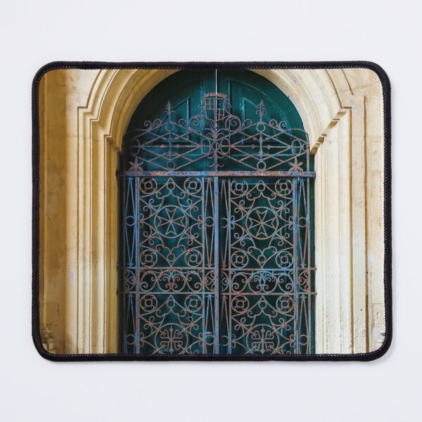 Item preview, Ornate Wrought Iron Gate in Arched Stone Entrance of Historic Mediterranean Building, Vintage Doorway designed and sold by Nmallia.