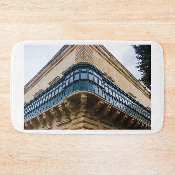 Item preview, Ornate Enclosed Balcony On Historic Stone Corner Building Showcasing Traditional Wooden Architecture designed and sold by Nmallia.