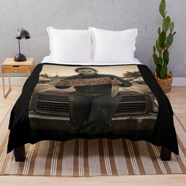 Item preview, Michael Myers Tshirts Funny Halloween Free Hugs designed and sold by Dibarassi.