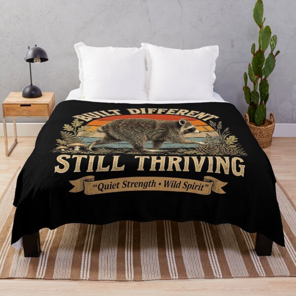 Item preview, Built Different Still Thriving Raccoon Meme Vintage designed and sold by Randomera.