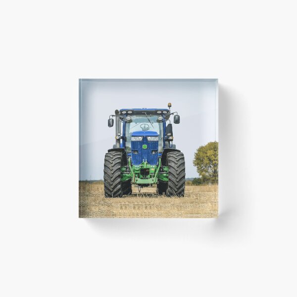 Item preview, Blue agricultural tractor in the field: powerful agricultural machine for farming. designed and sold by Mahilis.