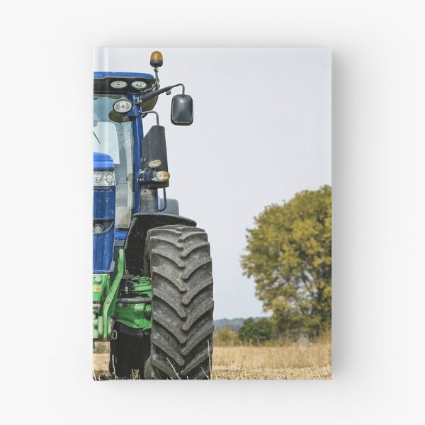 Item preview, Blue agricultural tractor in the field: powerful agricultural machine for farming. designed and sold by Mahilis.