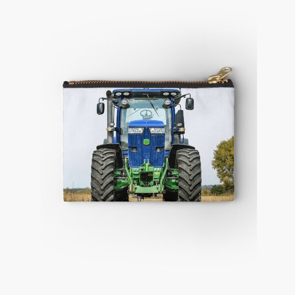 Item preview, Blue agricultural tractor in the field: powerful agricultural machine for farming. designed and sold by Mahilis.