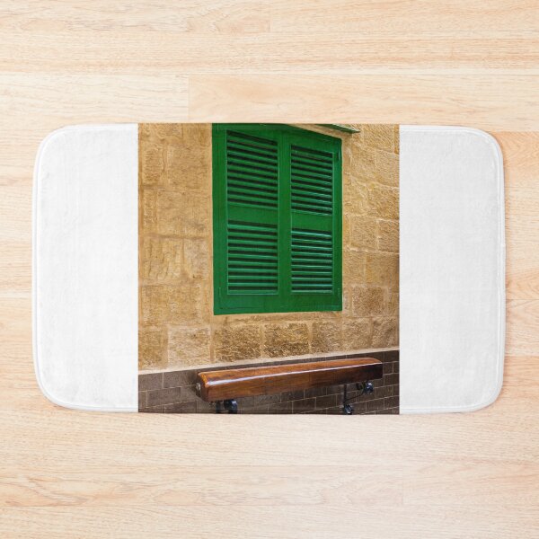 Item preview, Green Shuttered Window With Wooden Bench Against Rustic Stone Wall In Charming Alley designed and sold by Nmallia.