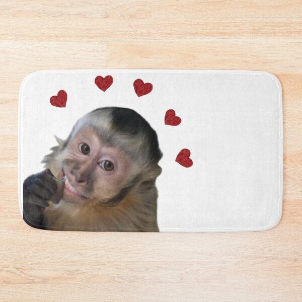 Item preview, Cute Smiling Monkey with Red Hearts - Wholesome Meme Sticker designed and sold by cezzarie.