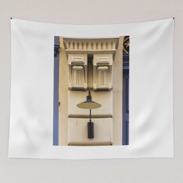 Item preview, Vintage Black Wall Lamp With Decorative Plaster Corbel on Historic Cream Building Façade Exterior Detail designed and sold by Nmallia.