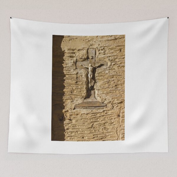 Item preview, Weathered Crucifix On Stucco Wall With Christ Figure In Sunlit Religious Relief designed and sold by Nmallia.