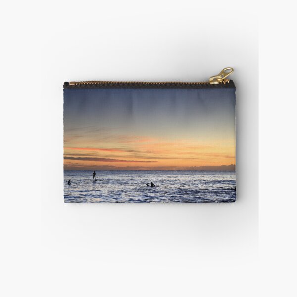 Item preview, Surfers and a stand-up paddleboarder enjoying the sunrise at Cabarita beach designed and sold by Rachel Elizabeth Photography.