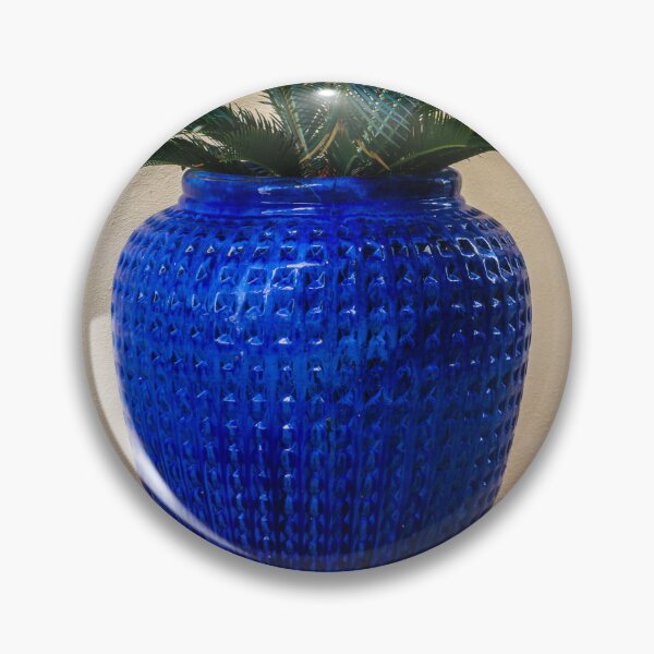 Item preview, Blue Ceramic Vase With Tropical Palm Plant Used As Decorative Outdoor Planter By A Stucco Wall designed and sold by Nmallia.