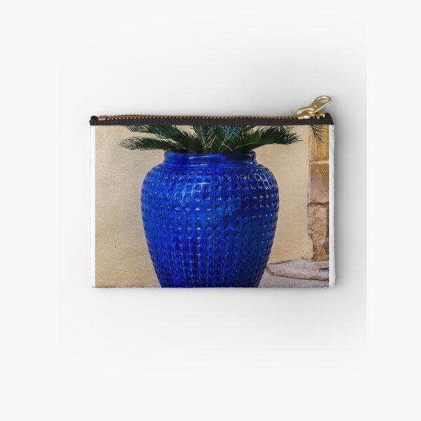 Item preview, Blue Ceramic Vase With Tropical Palm Plant Used As Decorative Outdoor Planter By A Stucco Wall designed and sold by Nmallia.