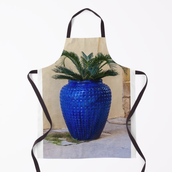 Item preview, Blue Ceramic Vase With Tropical Palm Plant Used As Decorative Outdoor Planter By A Stucco Wall designed and sold by Nmallia.