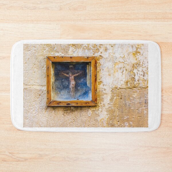 Item preview, Weathered Framed Crucifix On Old Plastered Wall Religious Icon Shrine In Rustic Street Scene designed and sold by Nmallia.