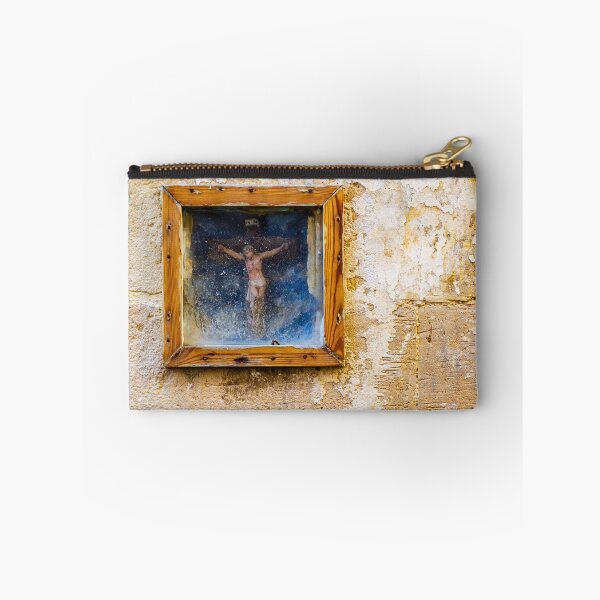 Item preview, Weathered Framed Crucifix On Old Plastered Wall Religious Icon Shrine In Rustic Street Scene designed and sold by Nmallia.