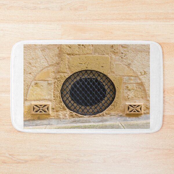 Item preview, Round Black Iron Grate Venting Set in Textured Yellow Sandstone Wall With Decorative Air Vents designed and sold by Nmallia.