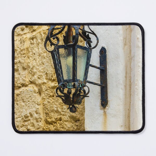 Item preview, Antique Wrought Iron Lantern Wall Sconce Mounted On Weathered Stone And Plaster Facade designed and sold by Nmallia.