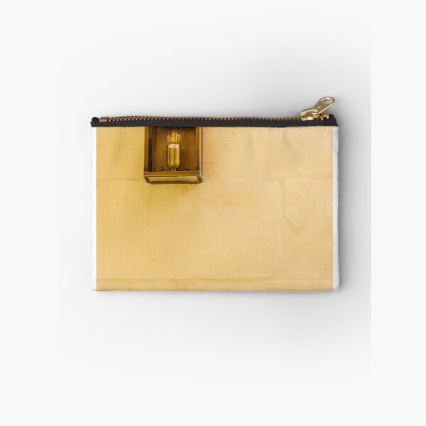 Item preview, Vintage Wall Lantern Closeup On Warm Stone Wall, Minimal Exterior Lighting And Architectural Texture designed and sold by Nmallia.