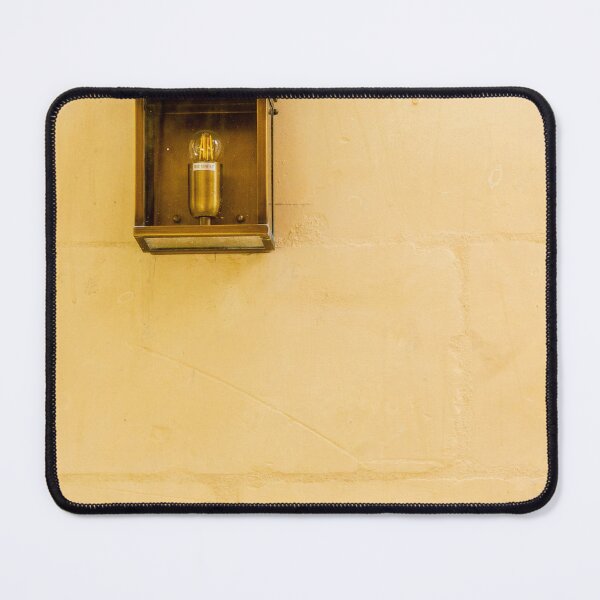 Item preview, Vintage Wall Lantern Closeup On Warm Stone Wall, Minimal Exterior Lighting And Architectural Texture designed and sold by Nmallia.