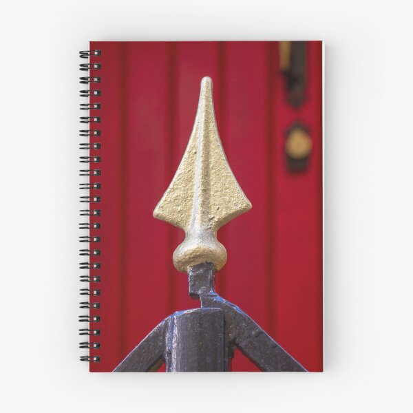 Item preview, Decorative Iron Gate With Gold Finials Guarding a Bright Red Wooden Door Entrance of Historic Home designed and sold by Nmallia.