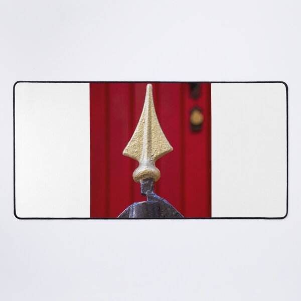 Item preview, Decorative Iron Gate With Gold Finials Guarding a Bright Red Wooden Door Entrance of Historic Home designed and sold by Nmallia.