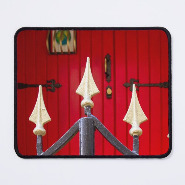 Item preview, Decorative Iron Gate With Gold Finials Guarding a Bright Red Wooden Door Entrance of Historic Home designed and sold by Nmallia.