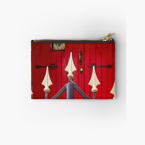 Item preview, Decorative Iron Gate With Gold Finials Guarding a Bright Red Wooden Door Entrance of Historic Home designed and sold by Nmallia.