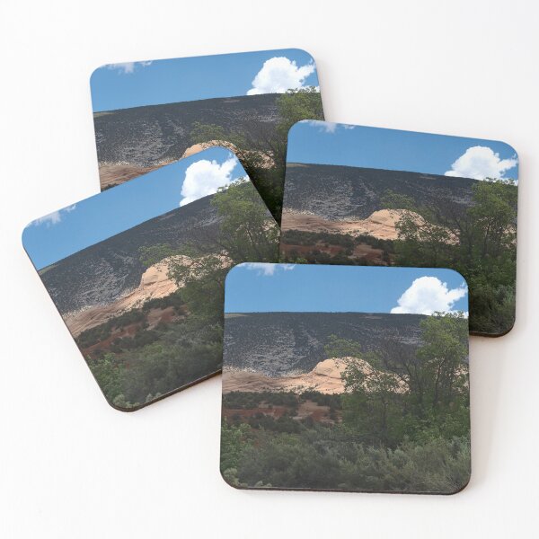 Item preview, Dinosaur National Monument formation bathed in sun spotlight amidst trees designed and sold by lisavonbiela.