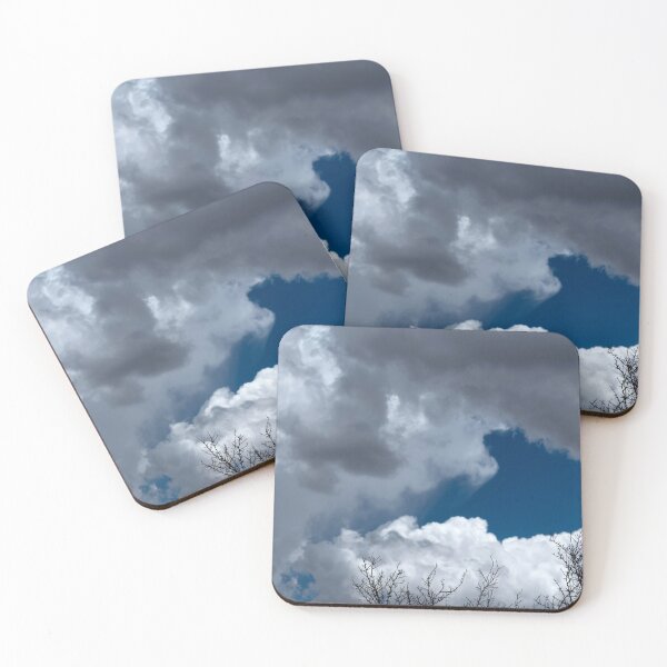 Item preview, Bare treetops silhouetted against massive cumulus clouds with trails designed and sold by lisavonbiela.