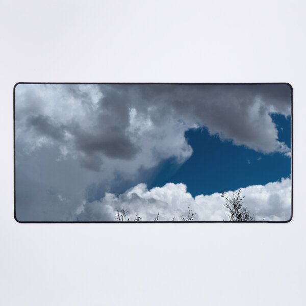Item preview, Bare treetops silhouetted against massive cumulus clouds with trails designed and sold by lisavonbiela.