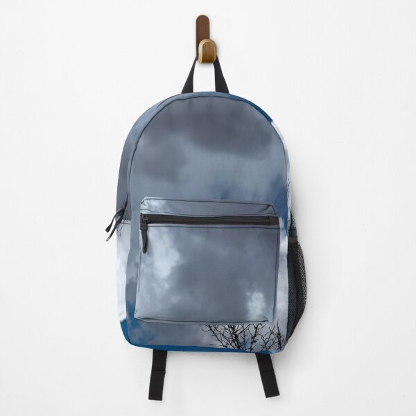 Item preview, Bare treetops silhouetted against massive cumulus clouds with trails designed and sold by lisavonbiela.