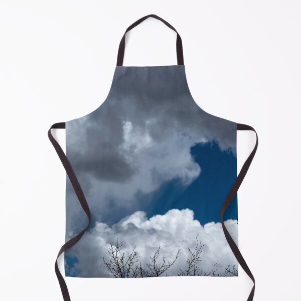 Item preview, Bare treetops silhouetted against massive cumulus clouds with trails designed and sold by lisavonbiela.