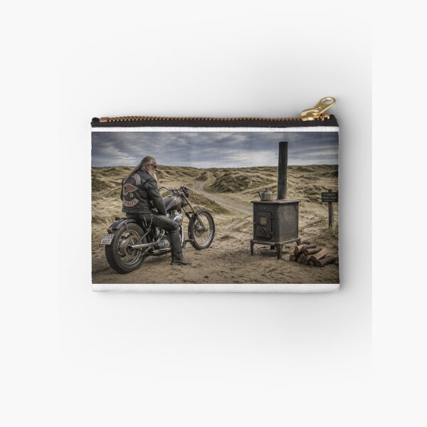 Item preview, A lone biker beside a wood-burning stove designed and sold by Per-Madsen.