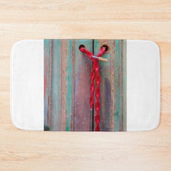Item preview, Red Chain And Padlock Securing Weathered Green Wooden Door With Rustic Vintage Texture designed and sold by Nmallia.