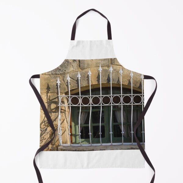 Item preview, Green Arched Window With Decorative White Wrought Iron Bars On Rustic Stone Wall In Sunlight designed and sold by Nmallia.
