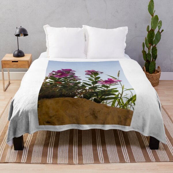 Item preview, Pink Garden Flowers Reaching Toward Blue Sky Over Stone Wall in Warm Sunlight designed and sold by Nmallia.