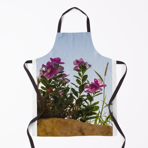 Item preview, Pink Garden Flowers Reaching Toward Blue Sky Over Stone Wall in Warm Sunlight designed and sold by Nmallia.