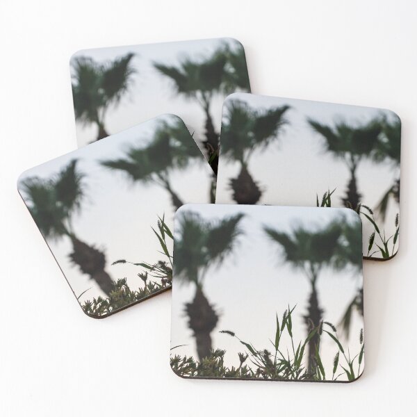 Item preview, Silhouetted Coastal Grasses With Blurred Palm Trees At Dusk Sky, Tropical Sunset Mood designed and sold by Nmallia.