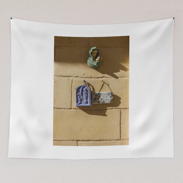 Item preview, Virgin Mary Madonna And Child Religious Plaques On Sunlit Stone Wall With Deep Shadows designed and sold by Nmallia.